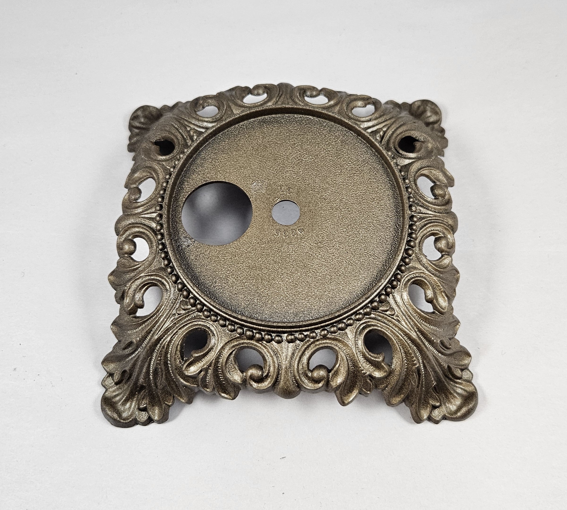 cast metal base in antique brass finish - insert top 3-1/4", Ht. 1-5/8", Bottom Spread 7-1/2"